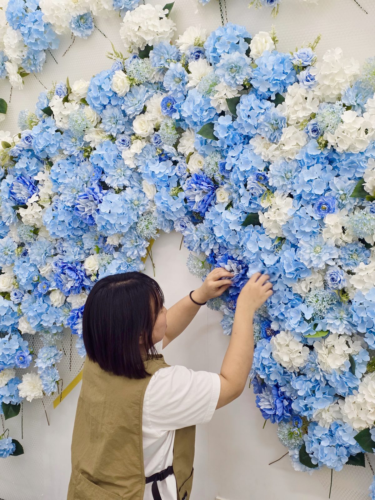 Giant flower photo zone installed in a junior photography studio