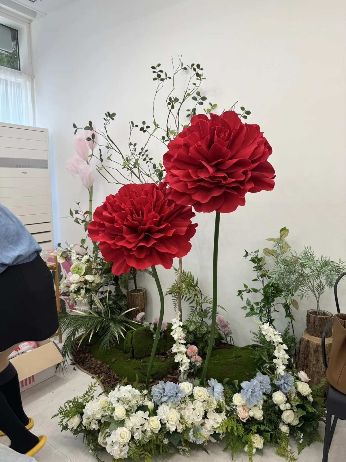 Giant carnation flower decor arranged for an appreciation event space