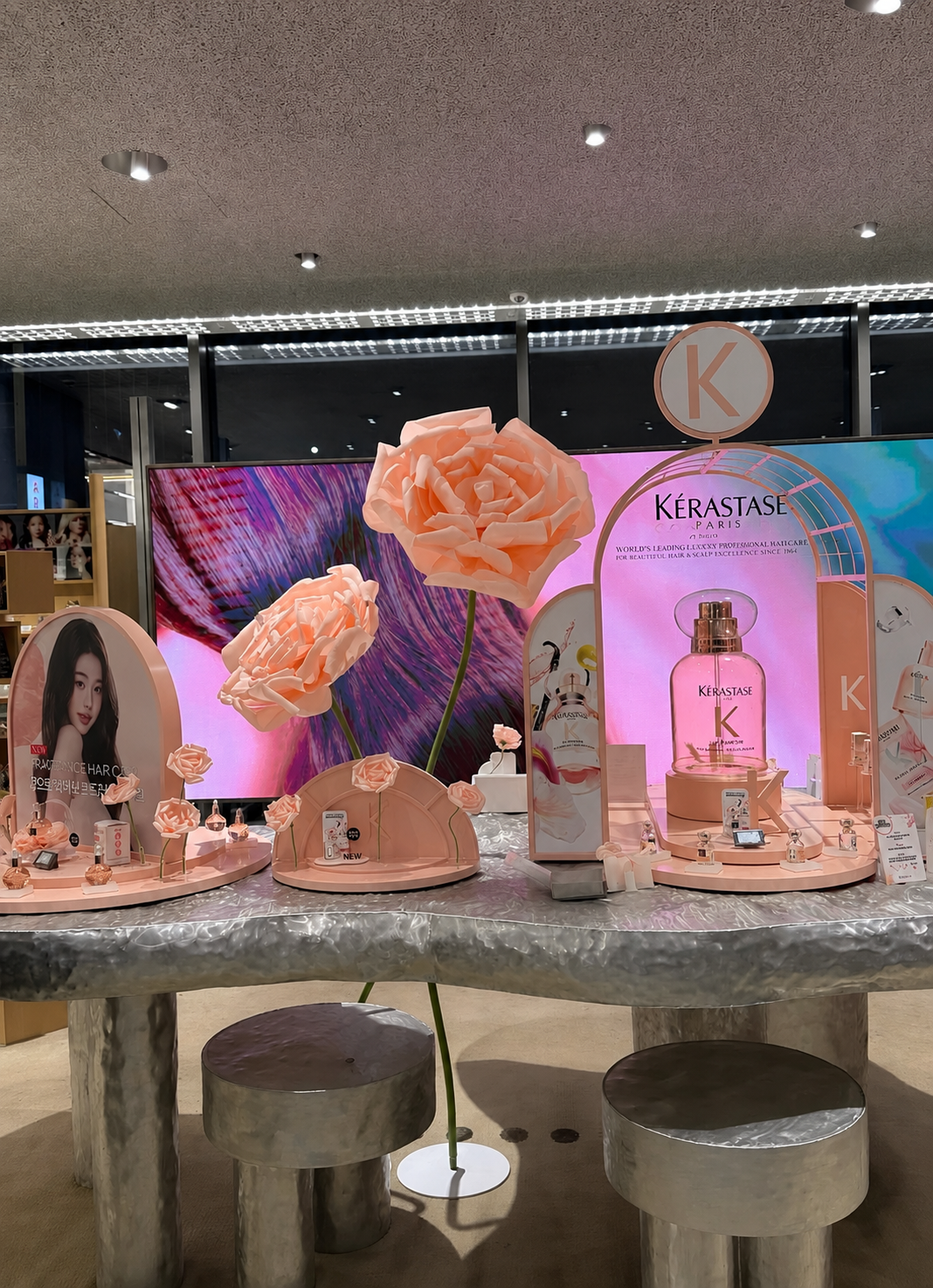 Product experience photo zone styled for a cosmetics brand pop-up